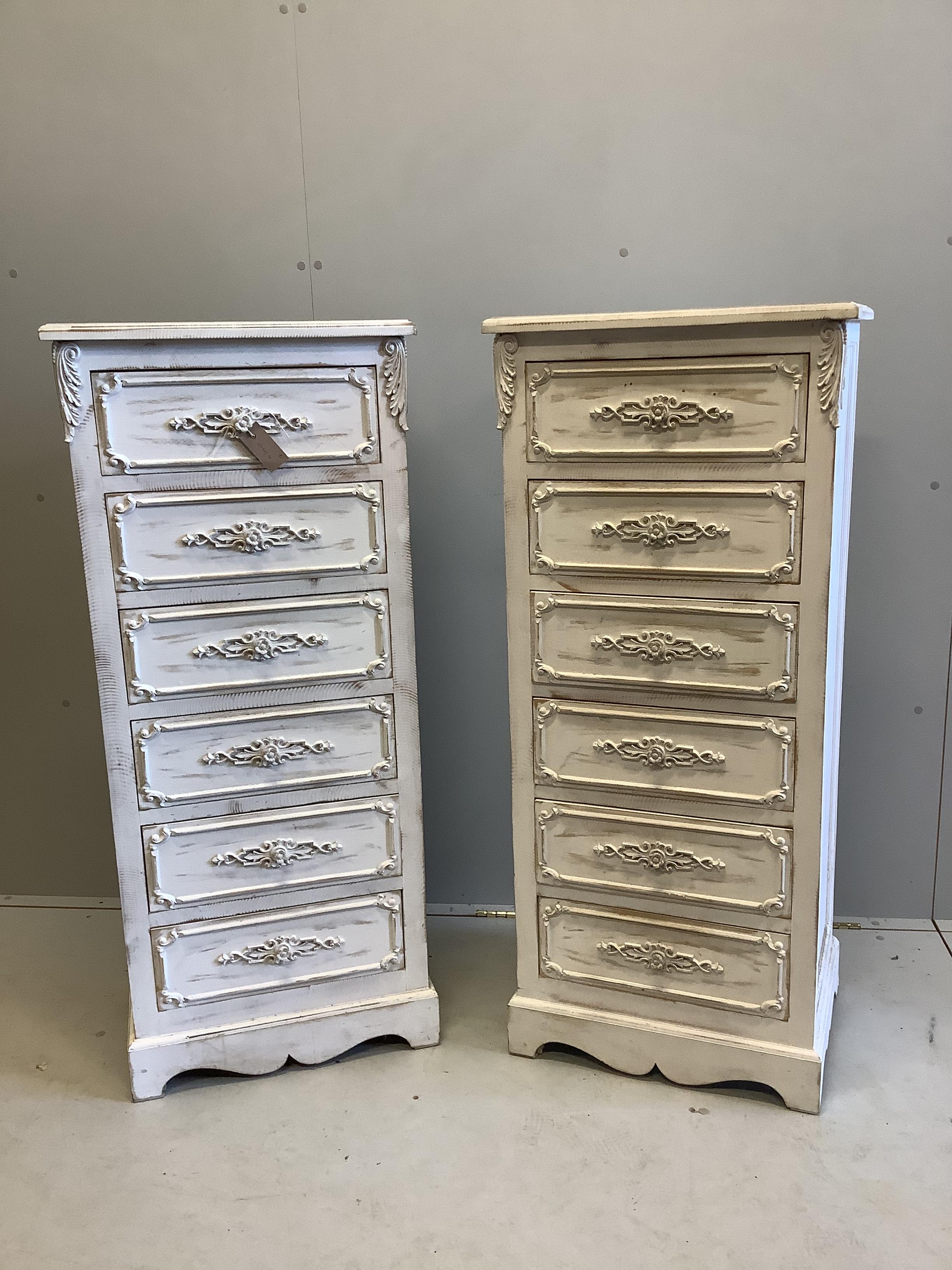 A pair of painted six drawer tall chests, width 52cm, depth 39cm, height 121cm